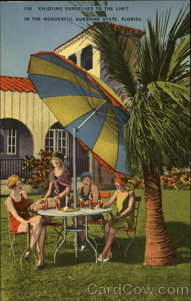 Women enjoying sun under umbrella in Florida