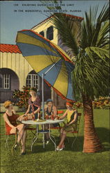 Women enjoying sun under umbrella in Florida Postcard