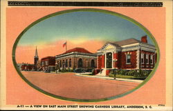 A view on East Main Street showing Carnegie Library Postcard