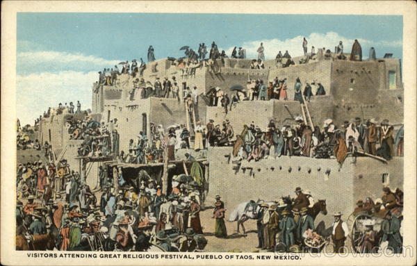 Visitors attending great religious festival Taos Pueblo New Mexico