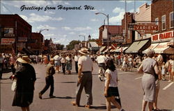 Street view after Musky Festival Parade Hayward, WI Postcard 