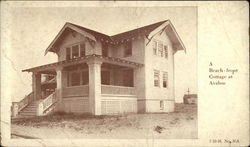 A beach front cottage Postcard