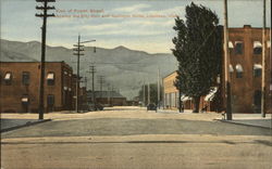 View of Fourth Street, showing City hall and Hellinger Hotel Postcard