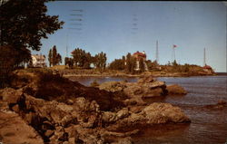 US Coast Guard Station on Lighthouse Point in Lake Superior Marquette, MI Postcard Postcard