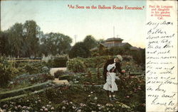 Paul de Longpre and Daughter in his Garden Postcard