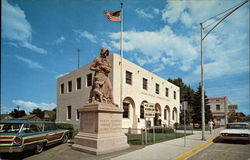 Looking Est Past the Madonna of the Trail Statue Postcard