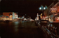 A night view of Minnesota Avenue Kansas City, KS Postcard Postcard