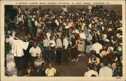 Novena clients being blessed outdoors, St. Ann's Shrine Postcard