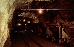 Ore Cars 2,500 Ft. below surface in the Montreal Mine Postcard