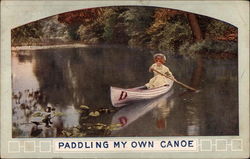 Woman Paddling a Canoe Postcard