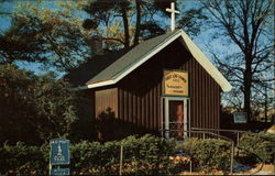 Replica of First Log Church Postcard