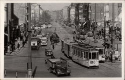 Downtown Street with trolleys and cars Postcard
