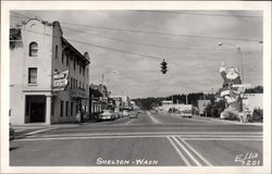 Street View with Intersection and Waving Santa Figure SHelton, WA Postcard 
