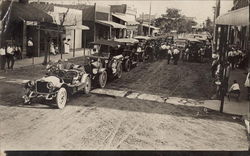 Cars Lined Up on the Street Wilson, KS Postcard Postcard