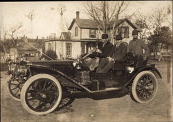 Three Men in an Early Automobile Postcard