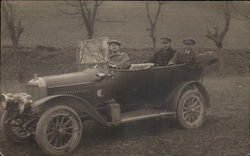 Three Men in an Early Automobile Postcard