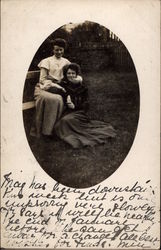 Two Women Sitting Postcard