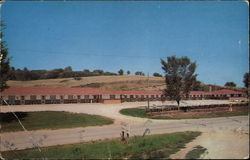 Decorah's Deluxe Motel Postcard