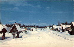 Main Street in the winter West Yellowstone, MT Postcard Postcard