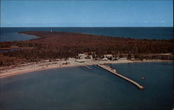 Harbor Lodge and the Light House in the Distance Presque Isle, MI Postcard Postcard