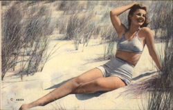 Woman inTwo-piece Bathing Suit Basks on the Sand Postcard