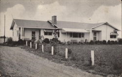 Howard's Motel Postcard