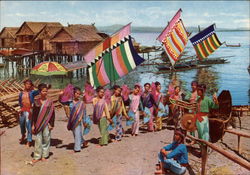Philippines' colorful dance, costume and setting with Vintas sailboats Postcard