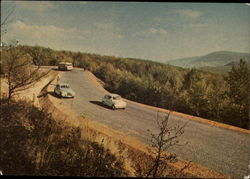 Cars on a Road in the Mountains Postcard