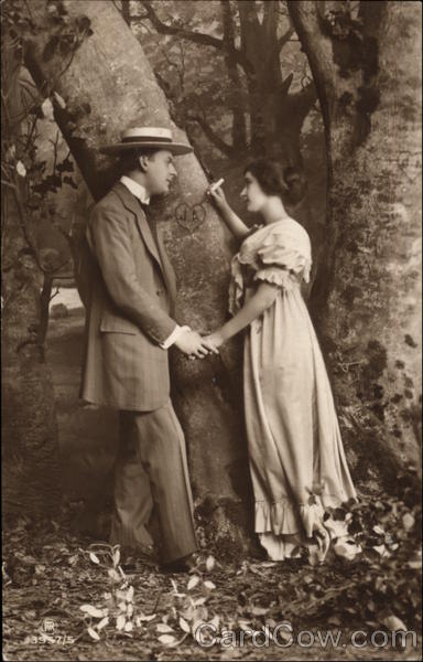 Couple Carving a Heart into a Tree Romance & Love