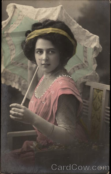 Young Woman Posing in Chair with Umbrella (Netherlands)