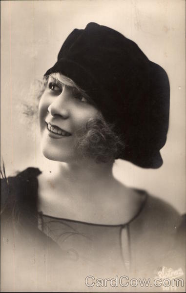 Young Woman Wearing a Black Hat Women