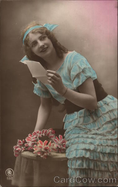 Young Woman in Blue Dress Reading a Letter Women