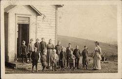 Children and Teacher Posing outside School House Children and Teacher Posing outside School House