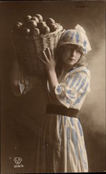 Young Woman Carrying Basket of Fruit Postcard