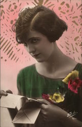 Young Woman Reading A Letter Postcard