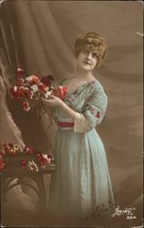Woman in Green Dress with Flowers Postcard