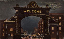 Welcome Arch at Night Postcard