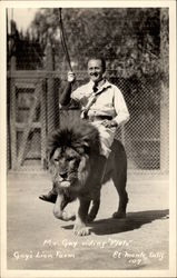 Mr. Gay riding "Pluto", Gay's Lion Farm Postcard