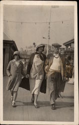 Family Walking on Boardwalk Postcard