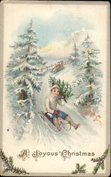 A Joyous Christmas - Boy Sledding with Christmas Tree Postcard