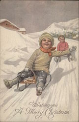 Children Tobogganing Down a Snowy Hill Postcard