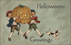 Two Children Carrying a Large Jack O' Lantern With a Dog Halloween Postcard Postcard