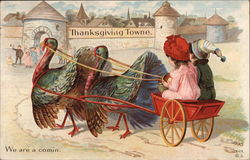 Two Children on a Turkey-Drawn Carriage to Thanksgiving Towne Postcard