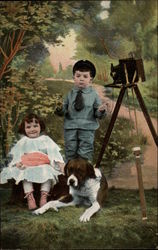 Two Children and Dog in a Park with a Camera on a Tripod Postcard