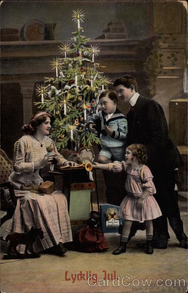 Family in Front of Christmas Tree