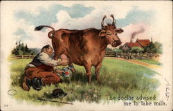 Man Milking Cow in a Field Postcard