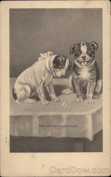 Two Dogs on a Table With Torn Heart