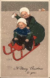 Two Girls on Red Toboggan Postcard