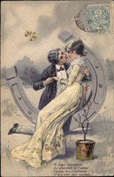 Couple Kissing with Horseshoe in Background Postcard