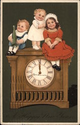 Three Children sitting on a Clock Postcard